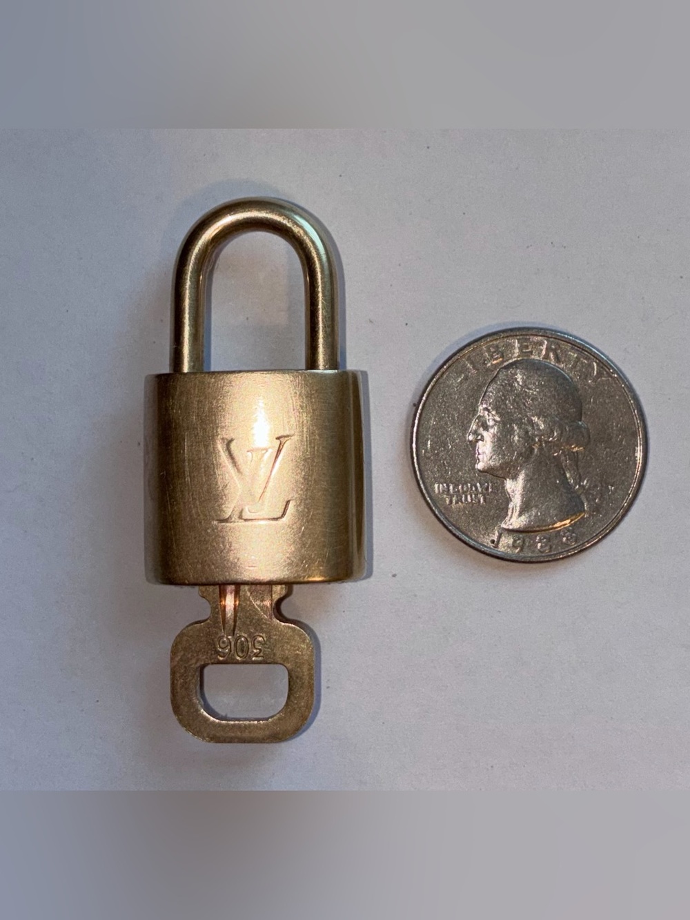 LOIUS VUITTON GOLD-TONE LOCK WITH LV ENGRAVING #306